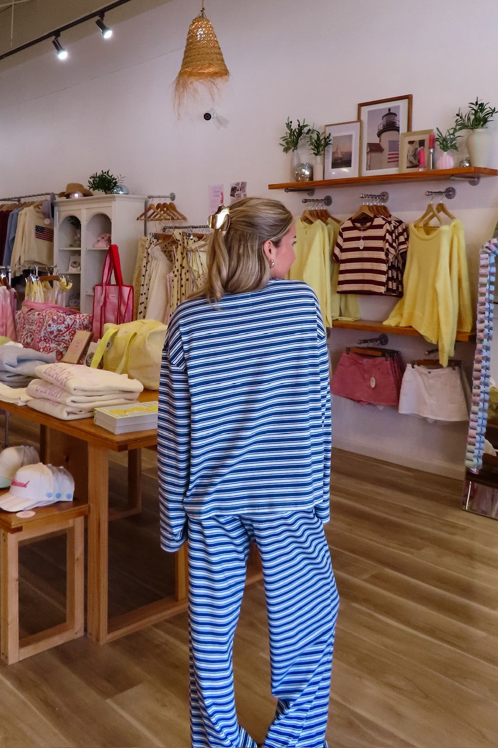 Blue, striped top with crew neckline, long sleeves, and drop shoulder