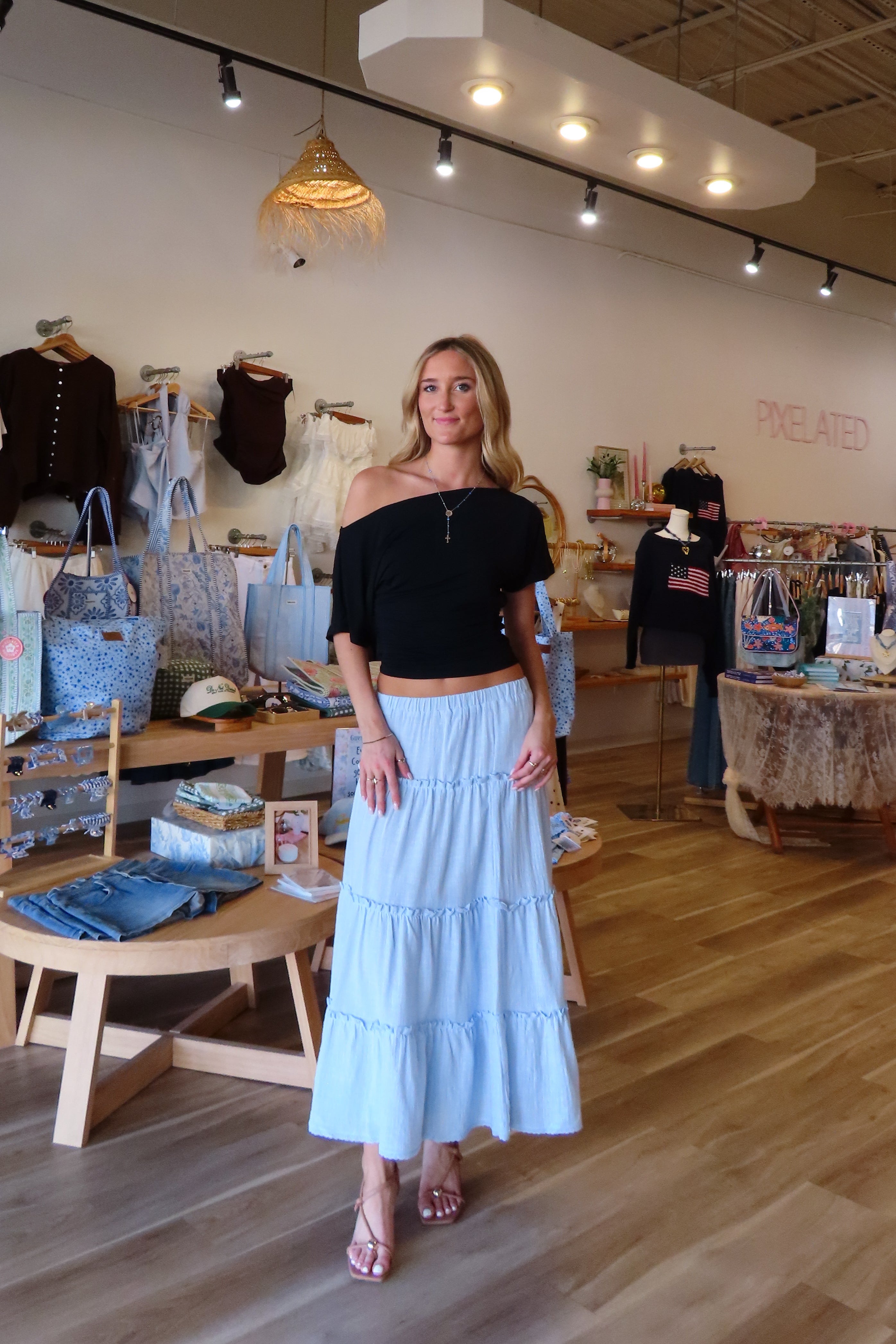 Pixelated Boutique, Women's Clothing, Online Shopping for Women, Fashion Trends 2026, Outfit Inspo, Virginia beach clothing stores, clothing stores in Virginia Beach, fashion outfits, fashion Inspo, women’s outfit 2026, outfit ideas, fashion, spring aesthetic, women’s spring outfit, spring style, spring break, blue maxi skirt, tiered skirt, blue skirt, summer skirt, spring skirt 
