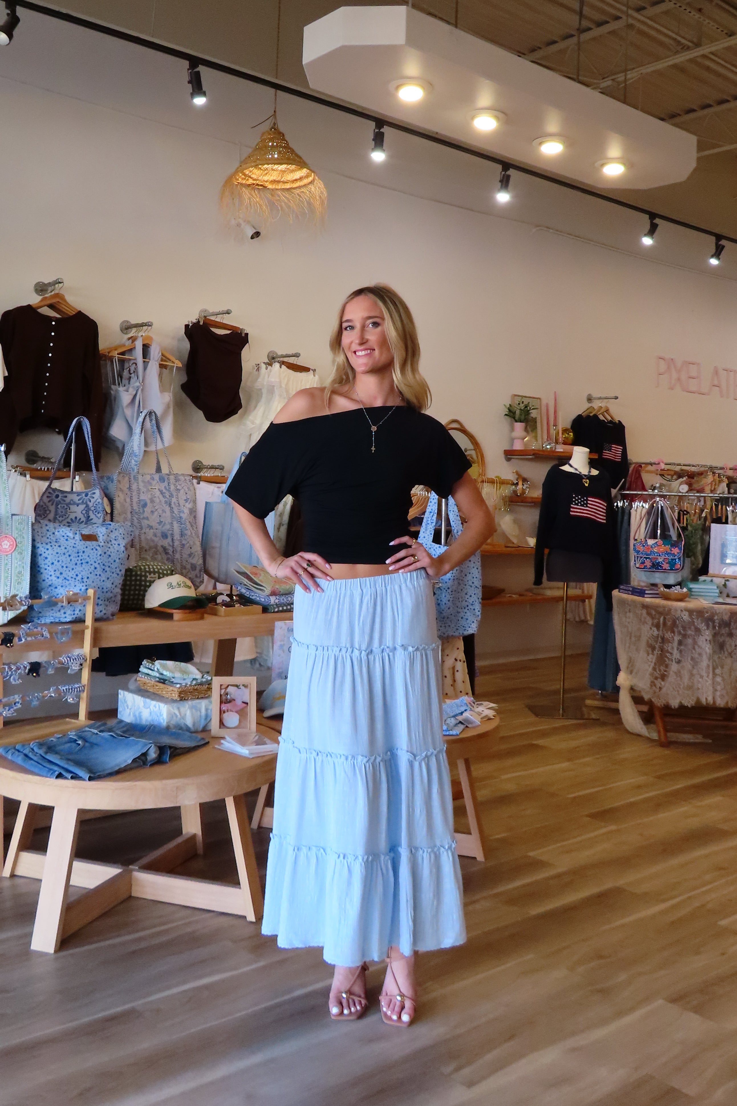 Pixelated Boutique, Women's Clothing, Online Shopping for Women, Fashion Trends 2026, Outfit Inspo, Virginia beach clothing stores, clothing stores in Virginia Beach, fashion outfits, fashion Inspo, women’s outfit 2026, outfit ideas, fashion, spring aesthetic, women’s spring outfit, spring style, spring break, blue maxi skirt, tiered skirt, blue skirt, summer skirt, spring skirt 