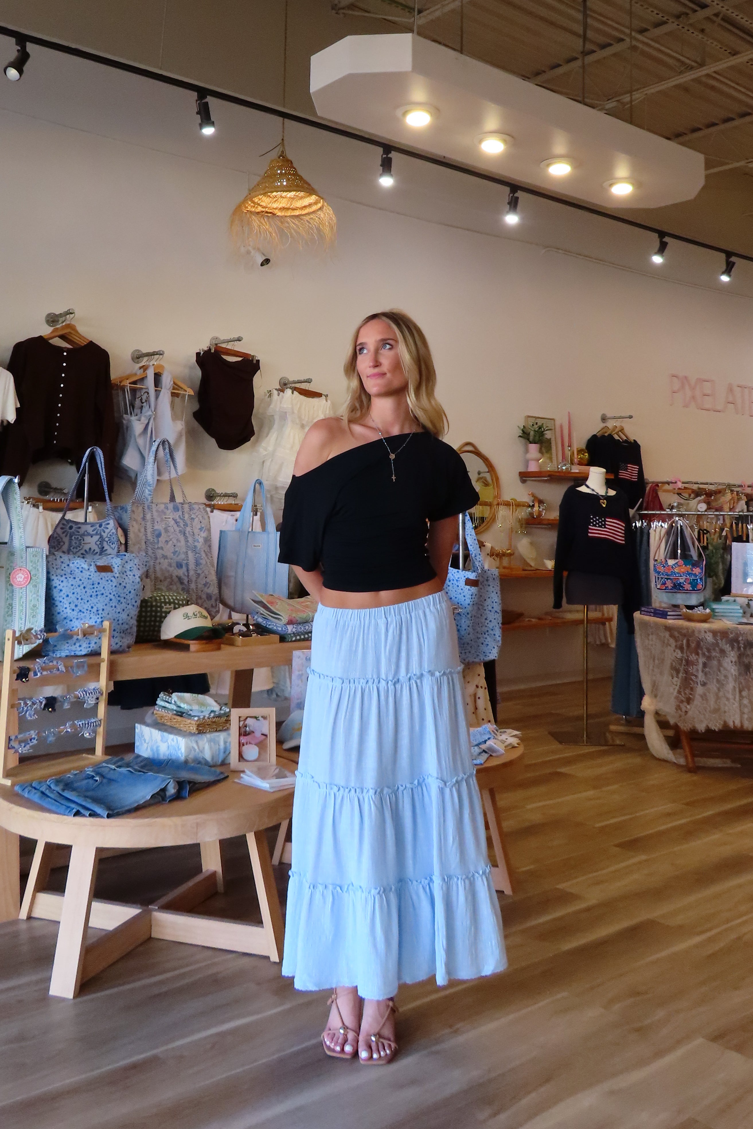 Pixelated Boutique, Women's Clothing, Online Shopping for Women, Fashion Trends 2026, Outfit Inspo, Virginia beach clothing stores, clothing stores in Virginia Beach, fashion outfits, fashion Inspo, women’s outfit 2026, outfit ideas, fashion, spring aesthetic, women’s spring outfit, spring style, spring break, blue maxi skirt, tiered skirt, blue skirt, summer skirt, spring skirt 