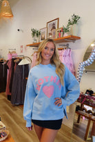 Pixelated Boutique, Women's Clothing, Online Shopping for Women, Fashion Trends 2026, Outfit Inspo, Virginia beach clothing stores, clothing stores in Virginia Beach, fashion outfits, fashion Inspo, women’s outfit 2026, outfit ideas, fashion, spring aesthetic, women’s spring outfit, spring style, spring break, crewneck, mother sweatshirt, Blue crewneck 