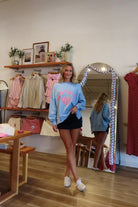 Pixelated Boutique, Women's Clothing, Online Shopping for Women, Fashion Trends 2026, Outfit Inspo, Virginia beach clothing stores, clothing stores in Virginia Beach, fashion outfits, fashion Inspo, women’s outfit 2026, outfit ideas, fashion, spring aesthetic, women’s spring outfit, spring style, spring break, crewneck, mother sweatshirt, Blue crewneck 