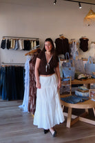 Pixelated Boutique, Women's Clothing, Online Shopping for Women, Fashion Trends 2026, Outfit Inspo, Virginia beach clothing stores, clothing stores in Virginia Beach, fashion outfits, fashion Inspo, women’s outfit 2026, outfit ideas, fashion, spring aesthetic, women’s spring outfit, spring style, spring break, blue maxi skirt, tiered skirt, blue skirt, summer skirt, spring skirt 