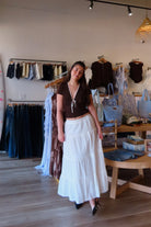 Pixelated Boutique, Women's Clothing, Online Shopping for Women, Fashion Trends 2026, Outfit Inspo, Virginia beach clothing stores, clothing stores in Virginia Beach, fashion outfits, fashion Inspo, women’s outfit 2026, outfit ideas, fashion, spring aesthetic, women’s spring outfit, spring style, spring break, white maxi skirt, tiered skirt, blue skirt, summer skirt, spring skirt