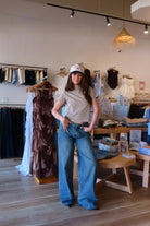 Pixelated Boutique, Women's Clothing, Online Shopping for Women, Fashion Trends 2026, Outfit Inspo, Virginia beach clothing stores, clothing stores in Virginia Beach, fashion outfits, fashion Inspo, women’s outfit 2026, outfit ideas, fashion, spring aesthetic, women’s spring outfit, spring style, spring break, sweater, Blue Jeans, Wide Leg, Baggy Jeans, Neutral Style 