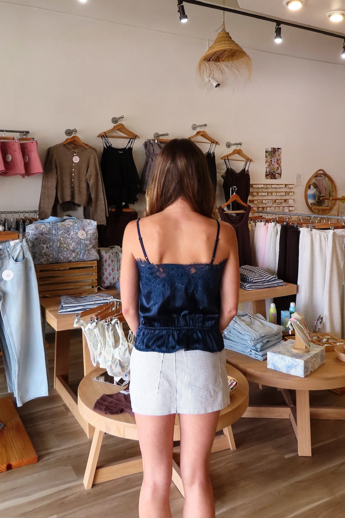 Navy blue, satin cami top with lace trim, waist drawstring tie, and adjustable straps | Pixelated Boutique, Virginia Beach Clothing Stores, Clothing Stores in Virginia Beach, Virginia Beach Boutique, 757 Boutique, Beach Fashion, Vacation Style, Coastal Cowgirl Aesthetic