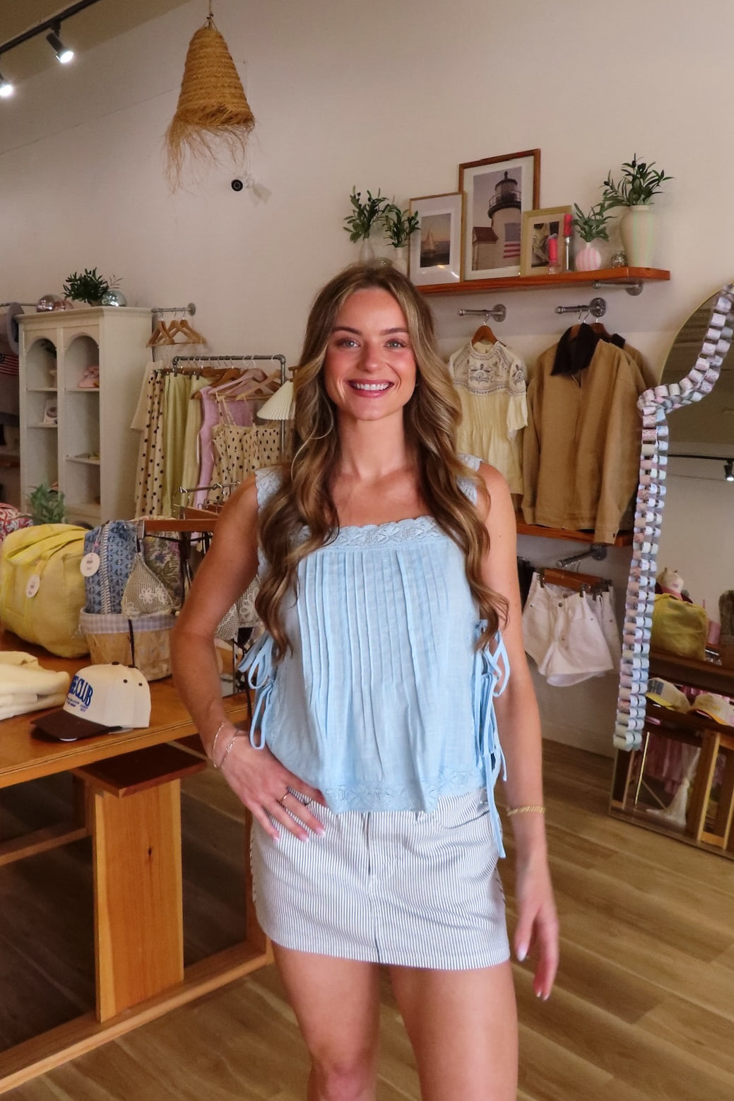 Blue, pin-tuck tank top with square neckline, side ties, and lace straps and trim | Pixelated Boutique, Online Shopping for Women, Women’s Boutique Clothing, Boutique Clothing for Women, Coastal Aesthetic Clothing, Vacation Outfits, Beach Boutique, Beach Outfits, Business Casual 