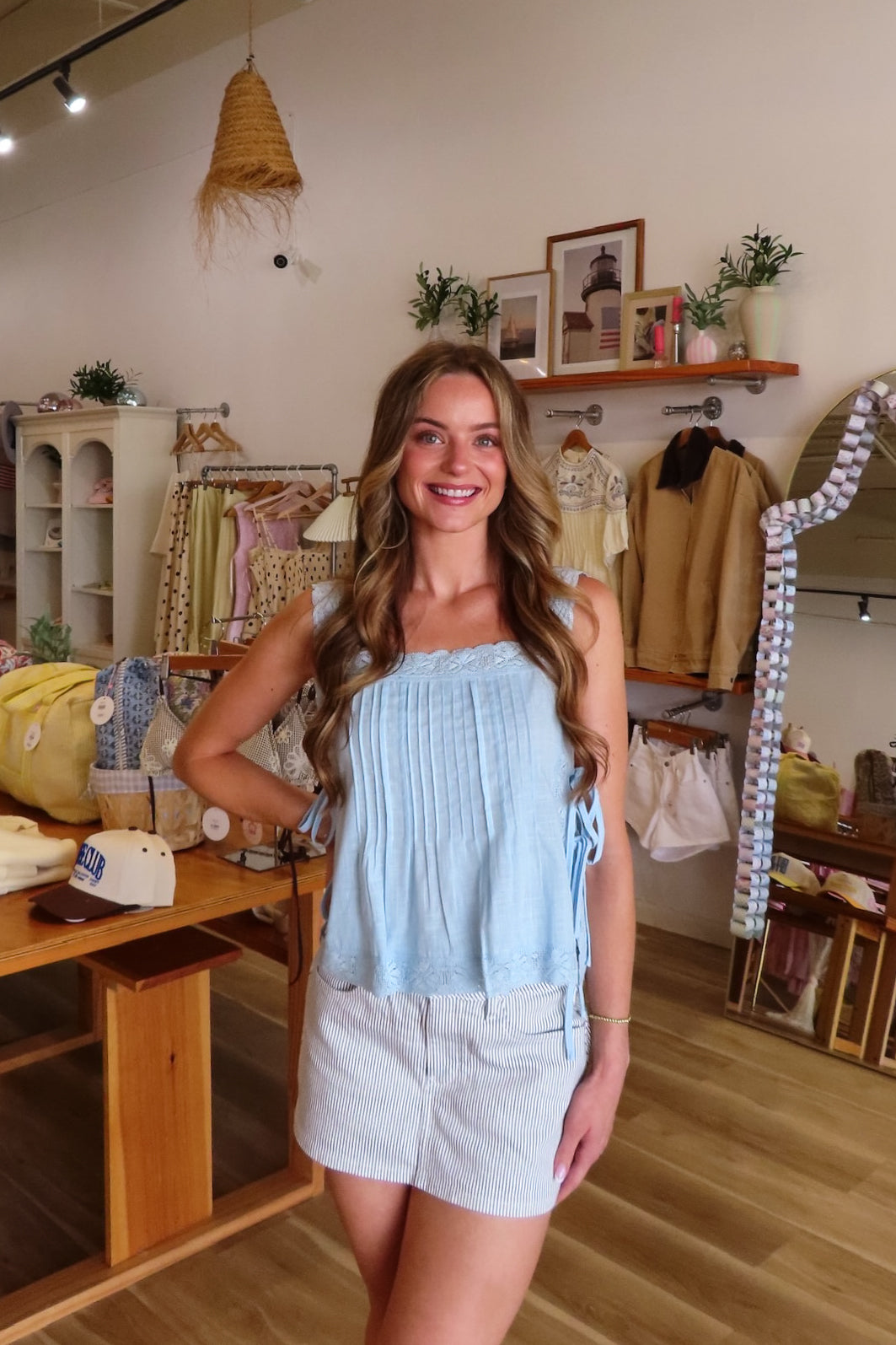 Blue, pin-tuck tank top with square neckline, side ties, and lace straps and trim | Pixelated Boutique, Online Shopping for Women, Women’s Boutique Clothing, Boutique Clothing for Women, Coastal Aesthetic Clothing, Vacation Outfits, Beach Boutique, Beach Outfits, Business Casual 