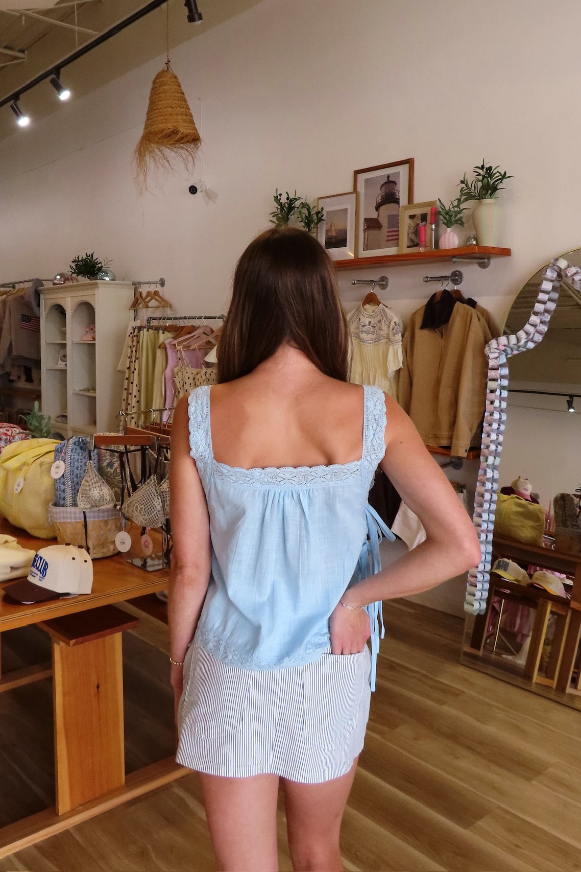 Blue, pin-tuck tank top with square neckline, side ties, and lace straps and trim | Pixelated Boutique, Online Shopping for Women, Women’s Boutique Clothing, Boutique Clothing for Women, Coastal Aesthetic Clothing, Vacation Outfits, Beach Boutique, Beach Outfits, Business Casual 