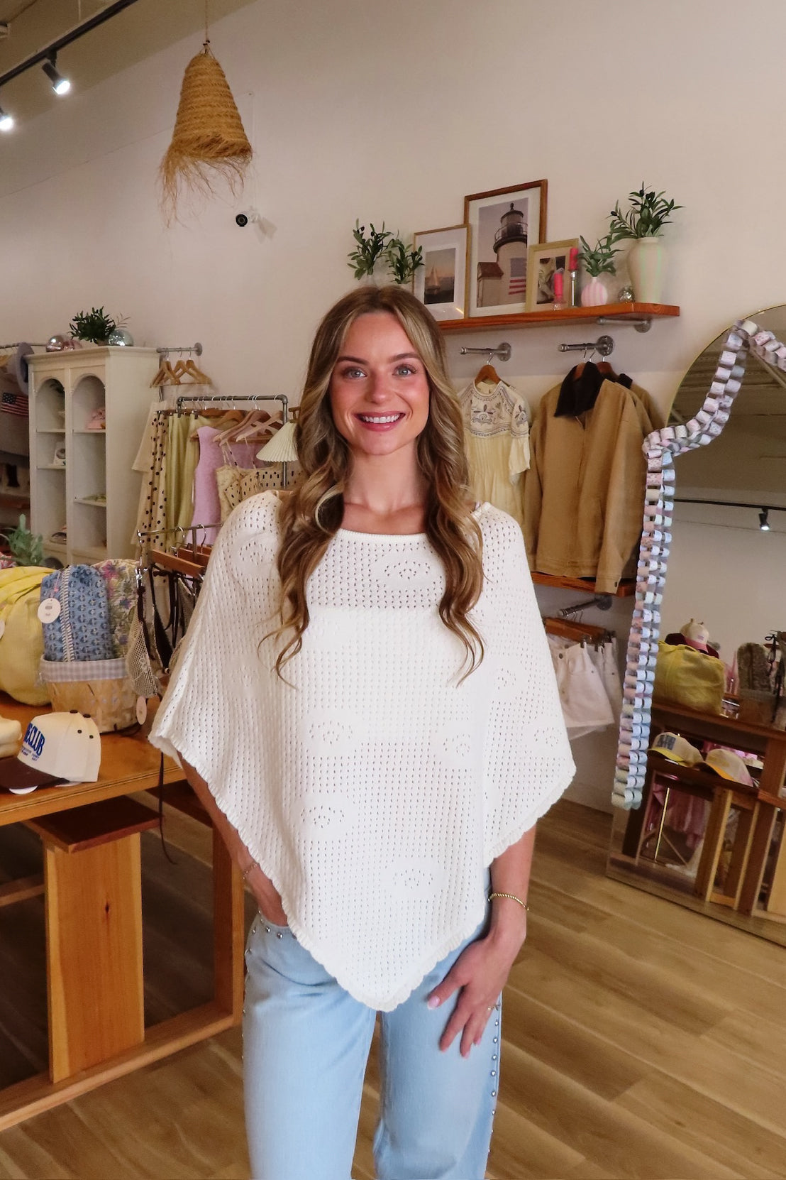White, knit poncho with boat neckline, scallop trim and floral details | Pixelated Boutique, Virginia Beach Clothing Stores, Clothing Stores in Virginia Beach, Virginia Beach Boutique, 757 Boutique, Beach Fashion, Vacation Style, Coastal Cowgirl Aesthetic