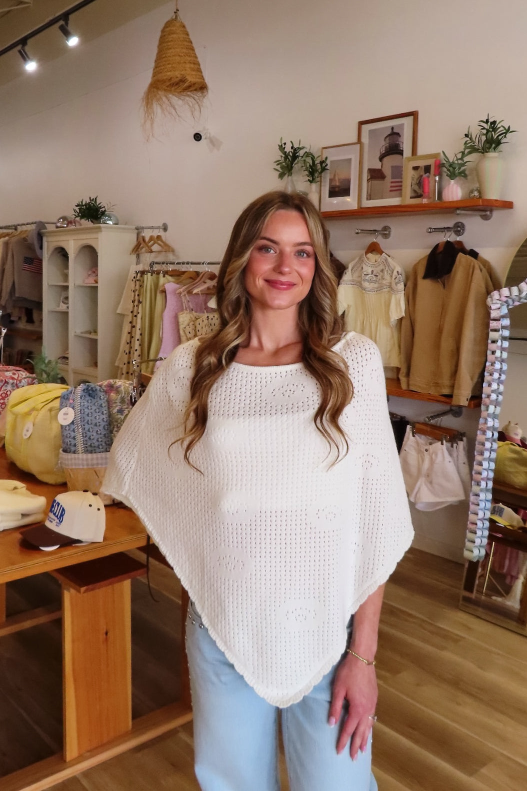 White, knit poncho with boat neckline, scallop trim and floral details | Pixelated Boutique, Virginia Beach Clothing Stores, Clothing Stores in Virginia Beach, Virginia Beach Boutique, 757 Boutique, Beach Fashion, Vacation Style, Coastal Cowgirl Aesthetic