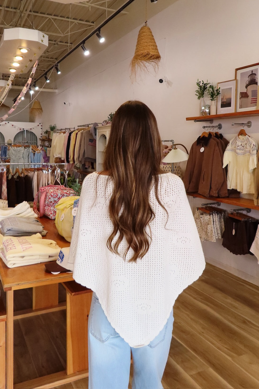 White, knit poncho with boat neckline, scallop trim and floral details | Pixelated Boutique, Virginia Beach Clothing Stores, Clothing Stores in Virginia Beach, Virginia Beach Boutique, 757 Boutique, Beach Fashion, Vacation Style, Coastal Cowgirl Aesthetic