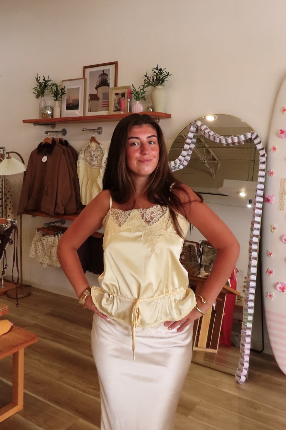 Yellow, satin cami top with lace trim, waist drawstring tie, and adjustable straps | Pixelated Boutique, Online Shopping for Women, Women’s Boutique Clothing, Boutique Clothing for Women, Coastal Aesthetic Clothing, Vacation Outfits, Beach Boutique, Beach Outfits, Business Casual 