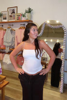 White, ribbed tank top with lined square neckline and corded spaghetti straps
Pixelated Boutique, Women's Clothing, Virginia Beach Clothing Stores, Clothing Stores in Virginia Beach, Virginia Beach Boutique, 757 Boutique, Online Shopping for Women, summer aesthetic, spring break, vacation style, vacation outfits, beach boutique, beach fashion, beach outfits, women’s boutique clothing, boutique clothing for women, coastal cowgirl outfits, coastal aesthetic clothing