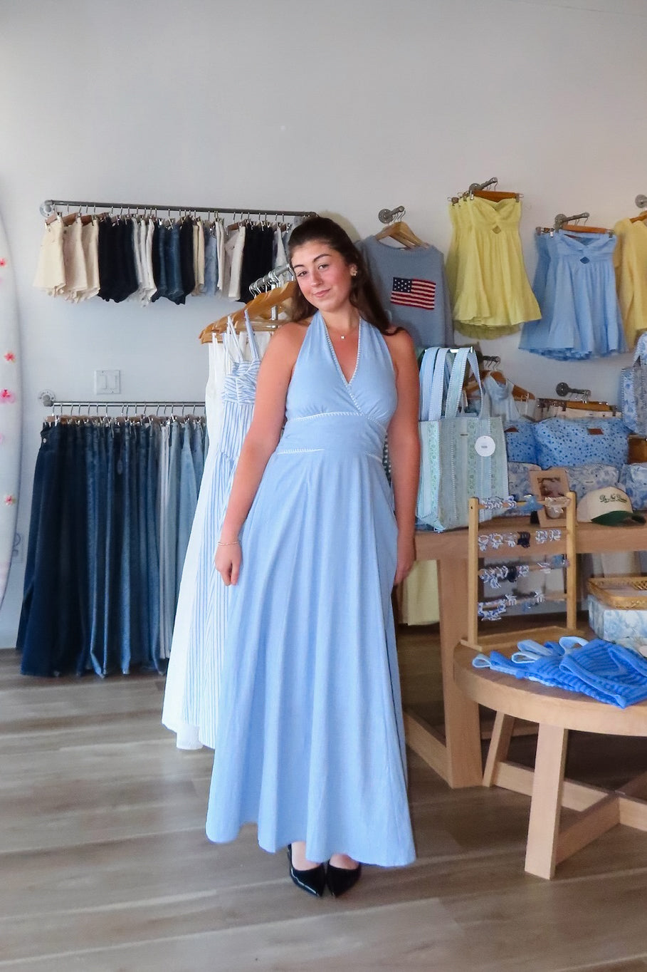 Blue, halter midi dress with V neckline, contrast thread, flare skirt, open back with smocking, and lining
Virginia Beach Boutique, 757 Boutique, fashion, summer aesthetic, women’s spring outfit, spring break, vacation style, vacation outfits, beach boutique, beach fashion, beach outfits, coastal aesthetic clothing, maxi dress, formal dress, wedding guest dress, satin slip dress, prom dress, graduation party dress