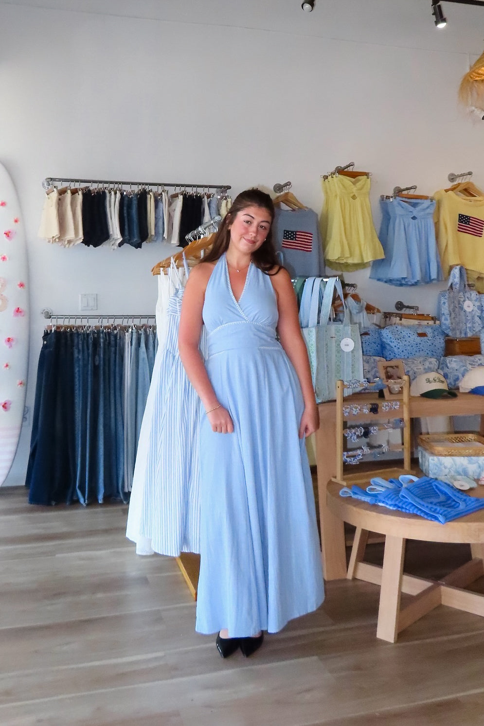 Blue, halter midi dress with V neckline, contrast thread, flare skirt, open back with smocking, and lining