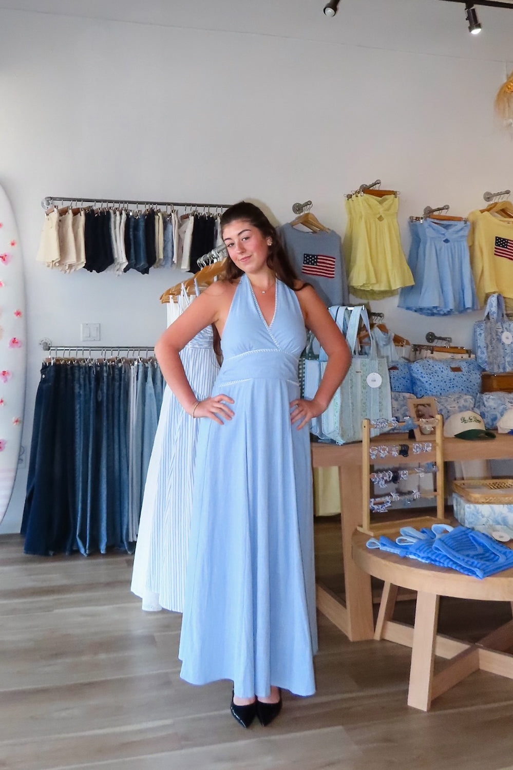 Blue, halter midi dress with V neckline, contrast thread, flare skirt, open back with smocking, and lining
Virginia Beach Boutique, 757 Boutique, fashion, summer aesthetic, women’s spring outfit, spring break, vacation style, vacation outfits, beach boutique, beach fashion, beach outfits, coastal aesthetic clothing, maxi dress, formal dress, wedding guest dress, satin slip dress, prom dress, graduation party dress