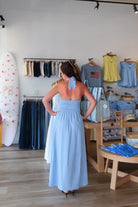 Blue, halter midi dress with V neckline, contrast thread, flare skirt, open back with smocking, and lining
Virginia Beach Boutique, 757 Boutique, fashion, summer aesthetic, women’s spring outfit, spring break, vacation style, vacation outfits, beach boutique, beach fashion, beach outfits, coastal aesthetic clothing, maxi dress, formal dress, wedding guest dress, satin slip dress, prom dress, graduation party dress