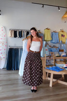Brown, polka dot midi skirt with drop waist and ruching smocked waistline, sleepy cowgirl, western fashion, coachella aesthetic
Pixelated Boutique, Women's Clothing, Virginia Beach Clothing Stores, Clothing Stores in Virginia Beach, Virginia Beach Boutique, 757 Boutique, Online Shopping for Women, summer aesthetic, spring break, vacation style, vacation outfits, beach boutique, beach fashion, beach outfits, women’s boutique clothing, boutique clothing for women, coastal cowgirl