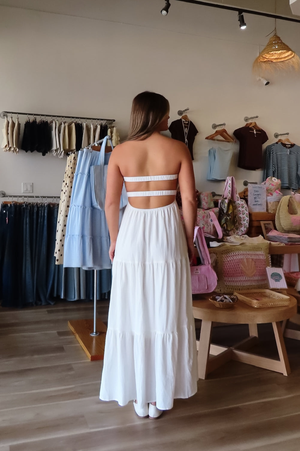 White, lined strapless maxi dress with twisted bust, center cutout, and double elasticated back straps
Pixelated Boutique, Women's Clothing, Virginia Beach Clothing Stores, Clothing Stores in Virginia Beach, Virginia Beach Boutique, 757 Boutique, Online Shopping for Women, summer aesthetic, brunch outfit, vacation style, vacation outfits, beach boutique, beach fashion, beach outfits, graduation dress, bachelorette dress