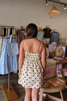 Cream, polka dot top/dress with empire waist, tunic length, adjustable straps, and front and back bows
757 Boutique, Online Shopping for Women, summer aesthetic, brunch outfit, vacation style, vacation outfits, beach boutique, beach fashion, beach outfits, women’s boutique clothing, boutique clothing for women, coastal cowgirl outfits, coastal aesthetic clothing, business casual, concert outfit, 2000s fashion, western outfits