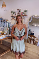 Green, mini dress with V neckline, contrast lace front and trim, adjustable straps, and ruffled hem
757 Boutique, Online Shopping for Women, summer aesthetic, brunch outfit, vacation style, vacation outfits, beach boutique, beach fashion, beach outfits, women’s boutique clothing, boutique clothing for women, coastal cowgirl outfits, coastal aesthetic clothing, business casual, concert outfit
