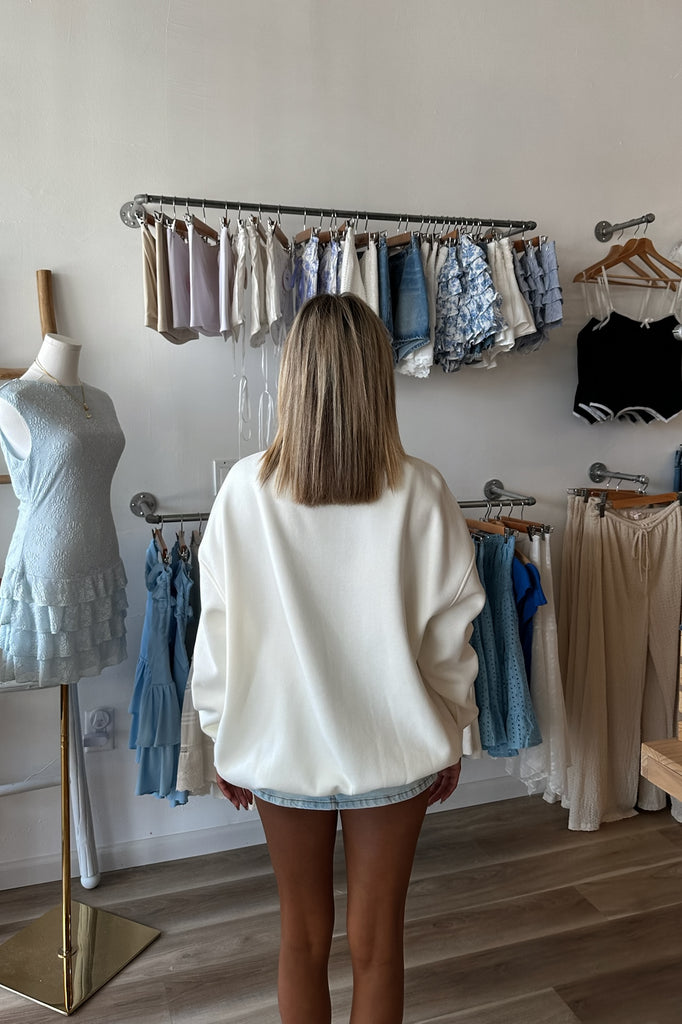 Cream Graphic Sweatshirt, Pixelated Boutique, Women's Clothing, Women's Jewelry and Gifts, Online Shopping for Women, Latest Fashion Trends 2025, Virginia Beach Clothing Stores, Clothing Stores in Virginia Beach, Aesthetic Fashion Trends, East Coast Fashion Styles, Sustainable Women's Clothing, Unique Gift Ideas for Women, Fall Fashion, Fall Outfit Ideas, Fall Fashion Inspiration, Womens Style, Outfit Inspo, Back to School Styles, Back to School Outfit