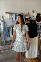 White with Blue Floral Print Mini Dress, Pixelated Boutique, Women's Clothing, Women's Jewelry and Gifts, Online Shopping for Women, Latest Fashion Trends 2025, Virginia Beach Clothing Stores, Clothing Stores in Virginia Beach, Aesthetic Fashion Trends, East Coast Fashion Styles, Sustainable Women's Clothing, Unique Gift Ideas for Women, Fall Fashion, Fall Outfit Ideas, Fall Fashion Inspiration, Womens Style, Outfit Inspo, Back to School Styles, Back to School Outfit, Runh Sorority Dress