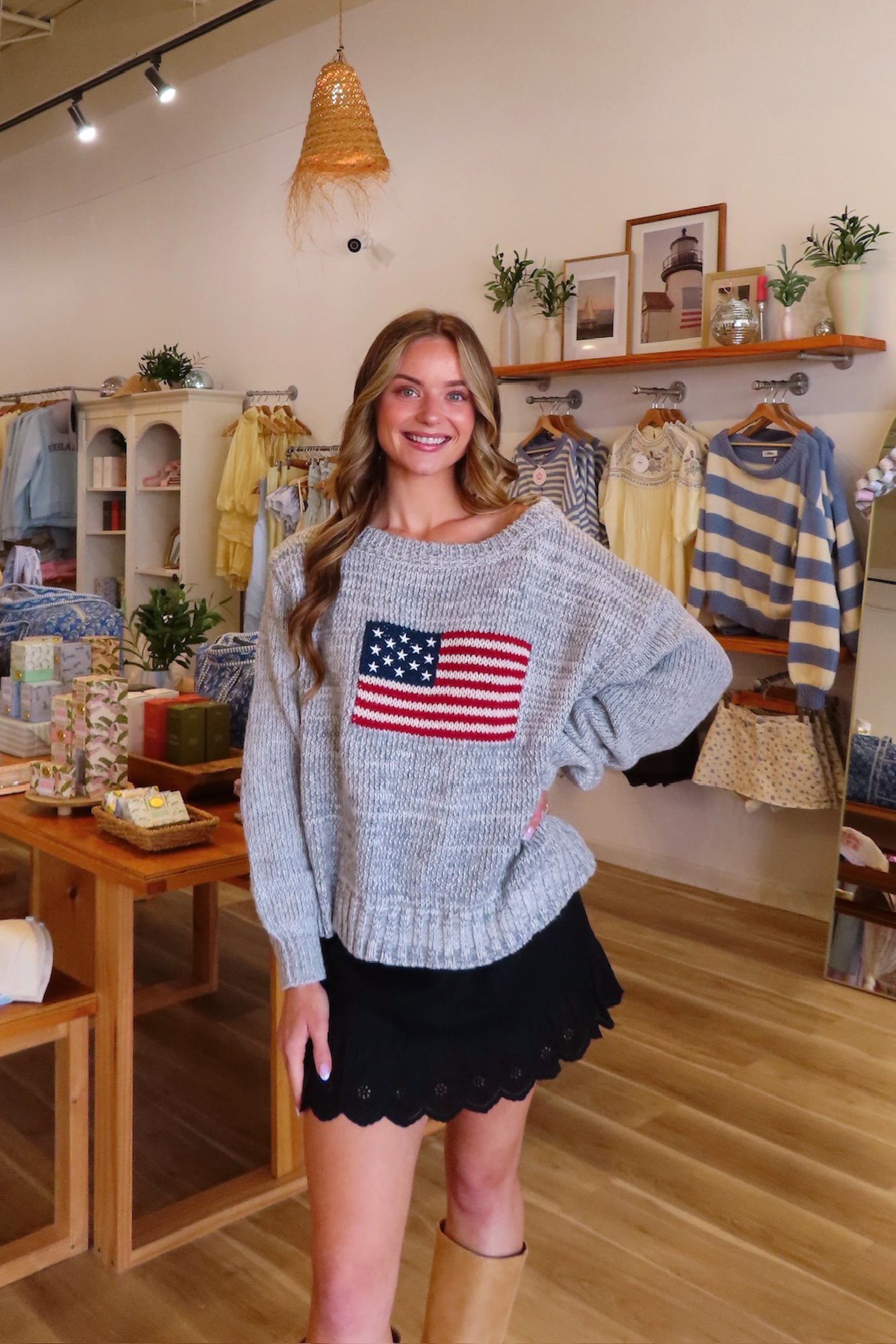 Gray, American flag sweater with boat neckline, ribbed hem, and oversized fit
