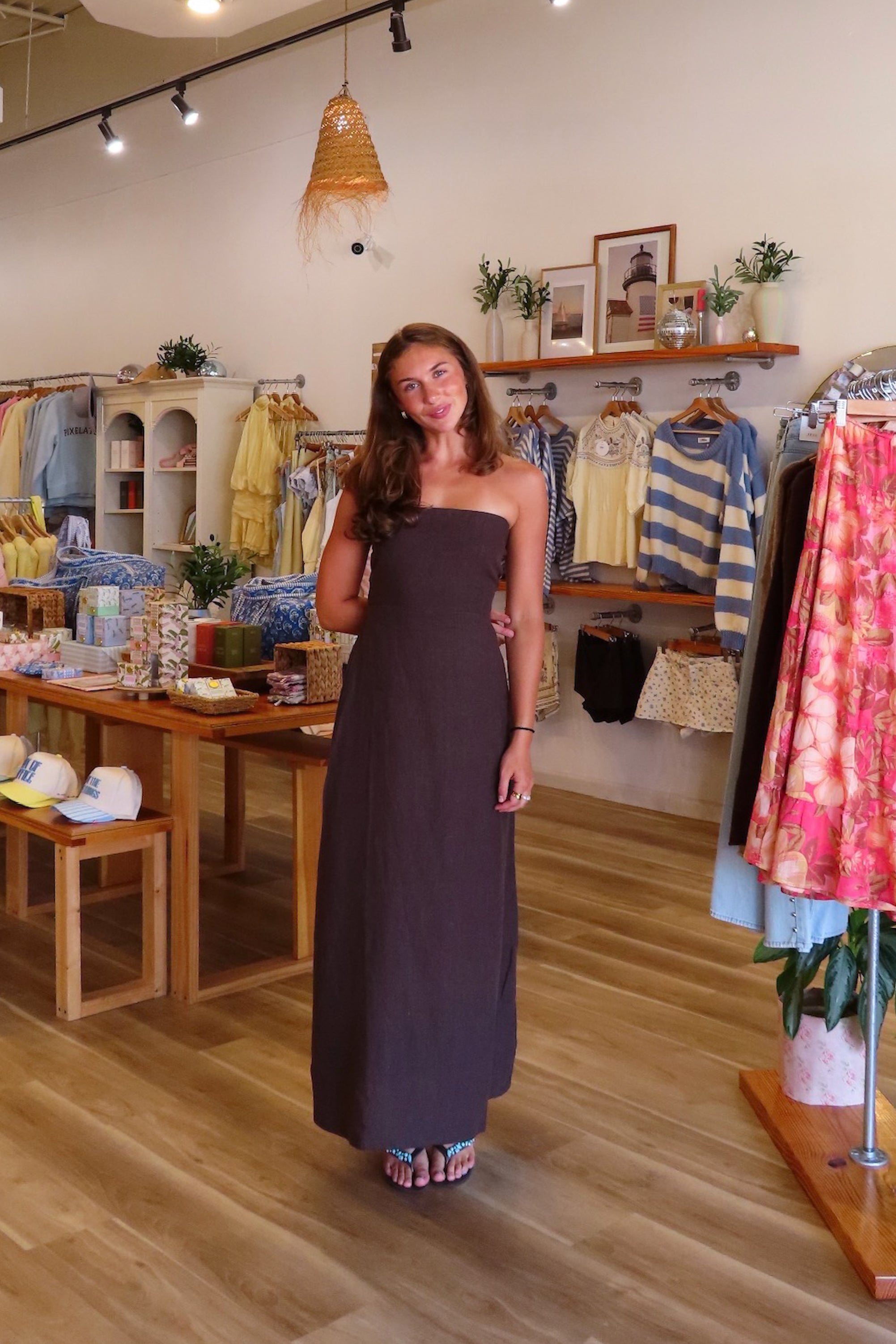 Brown, strapless linen maxi dress with flared hem and smocked back | Pixelated Boutique, Women's Clothing, Boutique Clothing for Women, Women’s Formal Dress, Women’s Occasion Dress, Maxi Dress, Wedding Guest Dress, Prom Dress, Graduation Party Dress 