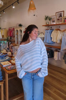 Blue, striped sweater with off shoulder neckline, oversized fit, and ribbed hem
Clothing Stores in Virginia Beach, Virginia Beach Boutique, 757 Boutique, Online Shopping for Women, summer aesthetic, brunch outfit, vacation style, vacation outfits, beach boutique, beach fashion, beach outfits, women’s boutique clothing, boutique clothing for women, coastal cowgirl outfits, coastal aesthetic clothing, business casual, concert outfit