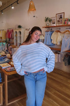 Blue, striped sweater with off shoulder neckline, oversized fit, and ribbed hem
Clothing Stores in Virginia Beach, Virginia Beach Boutique, 757 Boutique, Online Shopping for Women, summer aesthetic, brunch outfit, vacation style, vacation outfits, beach boutique, beach fashion, beach outfits, women’s boutique clothing, boutique clothing for women, coastal cowgirl outfits, coastal aesthetic clothing, business casual, concert outfit