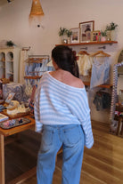 Blue, striped sweater with off shoulder neckline, oversized fit, and ribbed hem
Clothing Stores in Virginia Beach, Virginia Beach Boutique, 757 Boutique, Online Shopping for Women, summer aesthetic, brunch outfit, vacation style, vacation outfits, beach boutique, beach fashion, beach outfits, women’s boutique clothing, boutique clothing for women, coastal cowgirl outfits, coastal aesthetic clothing, business casual, concert outfit