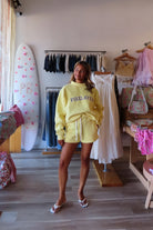 Yellow, sweatshorts with elastic waistband, drawstring, straight leg, and fleece lining
Pixelated Boutique, Virginia Beach Boutique, 757 Shopping, fleece sweatshorts women, women’s fleece shorts, cozy lounge set, luxury loungewear women, chic athleisure set, clean girl aesthetic sweatshirt, relaxed fit sweat set, fleece matching set, pilates outfit, summer sweatshirt