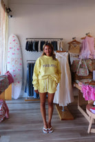 Yellow, sweatshorts with elastic waistband, drawstring, straight leg, and fleece lining
Pixelated Boutique, Virginia Beach Boutique, 757 Shopping, fleece sweatshorts women, women’s fleece shorts, cozy lounge set, luxury loungewear women, chic athleisure set, clean girl aesthetic sweatshirt, relaxed fit sweat set, fleece matching set, pilates outfit, summer sweatshirt