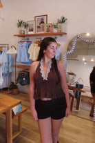 Brown, polka dot halter top with V neckline, front buttons, lace trim, smocked back, and peplum hem
757 Boutique, Online Shopping for Women, summer aesthetic, brunch outfit, vacation style, vacation outfits, beach boutique, beach fashion, beach outfits, women’s boutique clothing, boutique clothing for women, coastal cowgirl outfits, coastal aesthetic clothing, business casual, concert outfit, 2000s fashion, western outfits