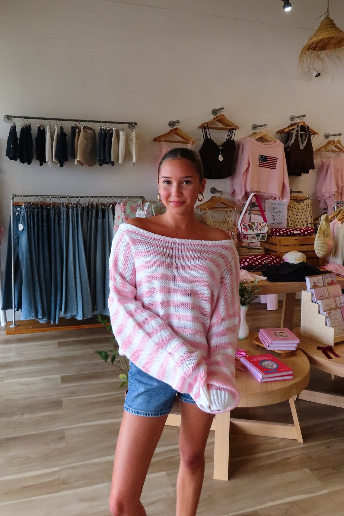 Pink, striped sweater with off shoulder neckline, oversized fit, and ribbed hem, cozy cropped sweater, pink stripes, beach sweater, coastal cowgirl, beach fashion, beach boutique, Virginia Beach boutique, summer fashion 2026