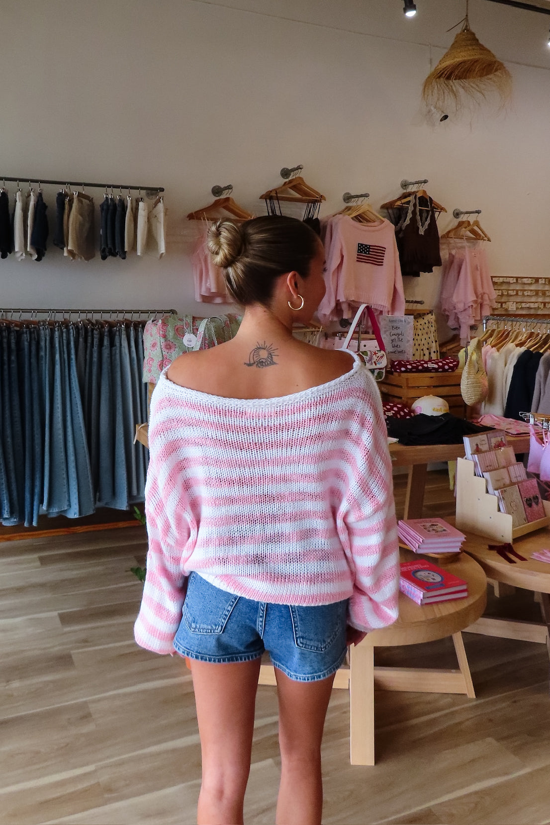 Pink, striped sweater with off shoulder neckline, oversized fit, and ribbed hem, cozy cropped sweater, pink stripes, beach sweater, coastal cowgirl, beach fashion, beach boutique, Virginia Beach boutique, summer fashion 2026
