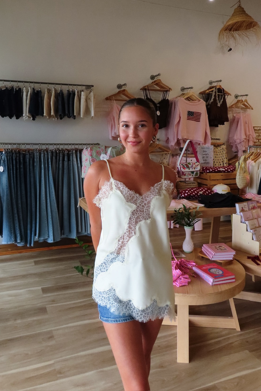 Cream, satin cami top with V neckline, asymmetric hem, scalloped lace trim, and adjustable straps, women’s lace going out top, date night lace top, asymmetrical hem top, girls night out top, vacation dinner outfit top
