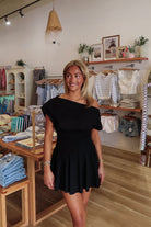 Black, jersey mini dress with asymmetric off shoulder neckline, smocked waist, and flared skirt, little black dress, party dress, Pixelated Boutique, Women's Clothing, Virginia Beach Clothing Stores, Clothing Stores in Virginia Beach, Virginia Beach Boutique, 757 Boutique, Online Shopping for Women