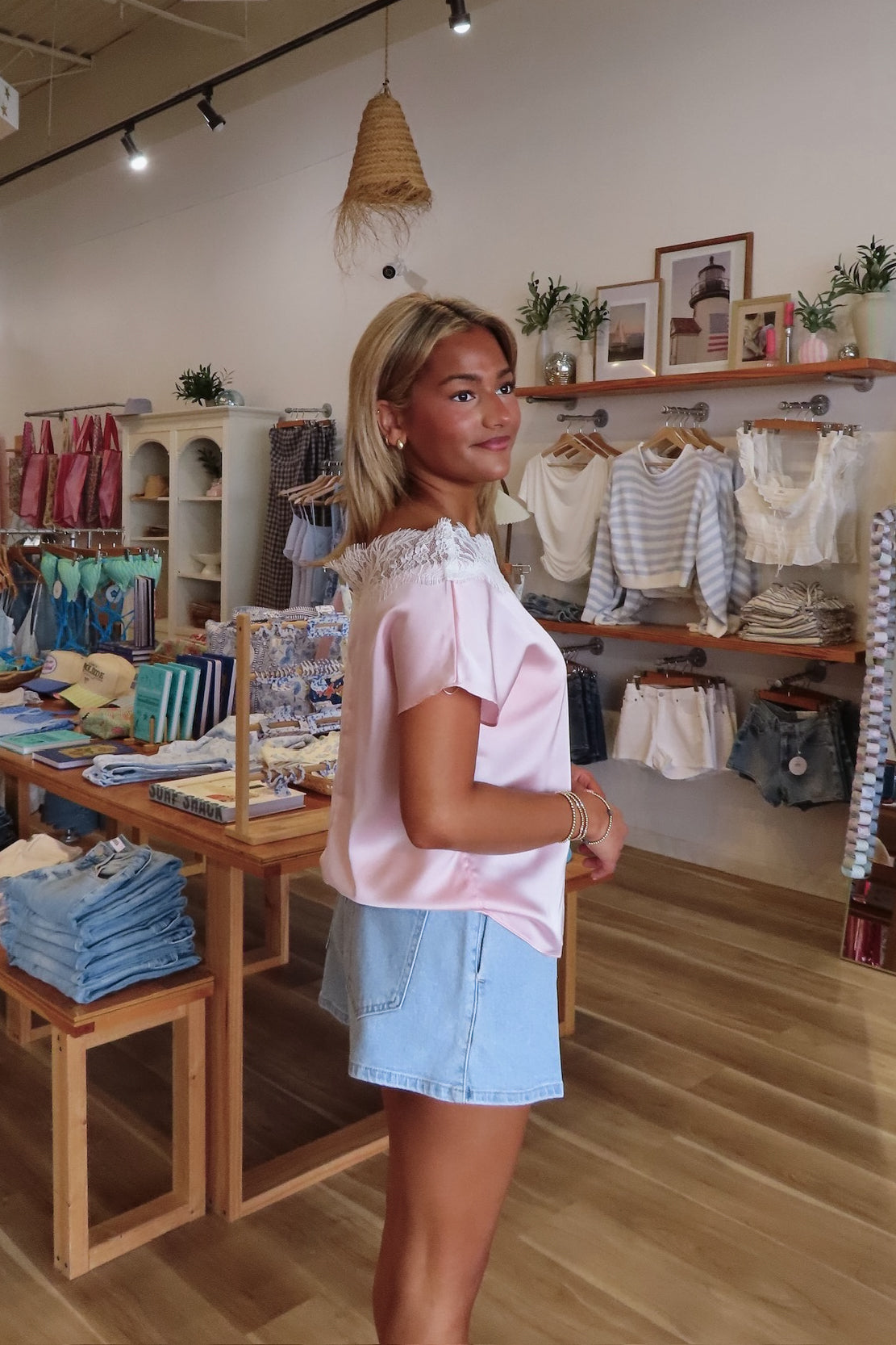 Blue, light denim shorts with high rise, bubble silhouette, and front pleats, vintage shorts, high rise denim shorts, pleated shorts, pleated, summer shorts, beach boutique, casual summer shorts, summer denim