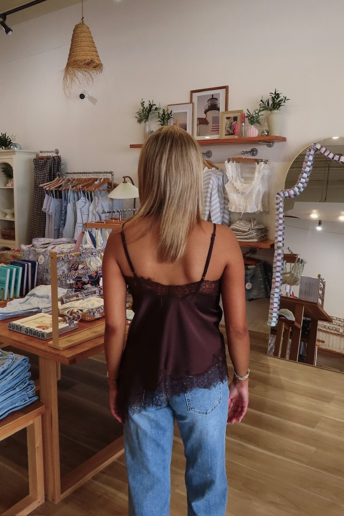 Brown, satin cami top with V neckline, asymmetric hem, scalloped lace trim, and adjustable straps, women’s lace going out top, date night lace top, asymmetrical hem top, girls night out top, vacation dinner outfit top