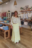Yellow, tiered maxi skirt with elastic waistband and lining