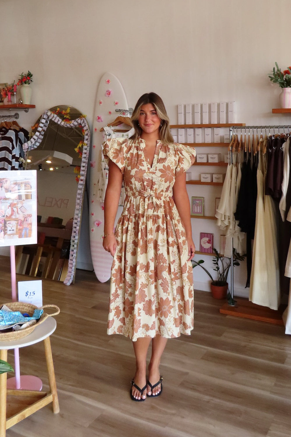 Brown, floral midi dress with V neckline, puff sleeves, waist tie, and side pockets | Pixelated Boutique, Boutique Shopping in Virginia Beach, Women’s Boutique, Fall Fashion, Fall Dresses, Fall Shopping, Trendy Fall Outfits, Women’s Fall Clothing, Casual Fall Outfits
