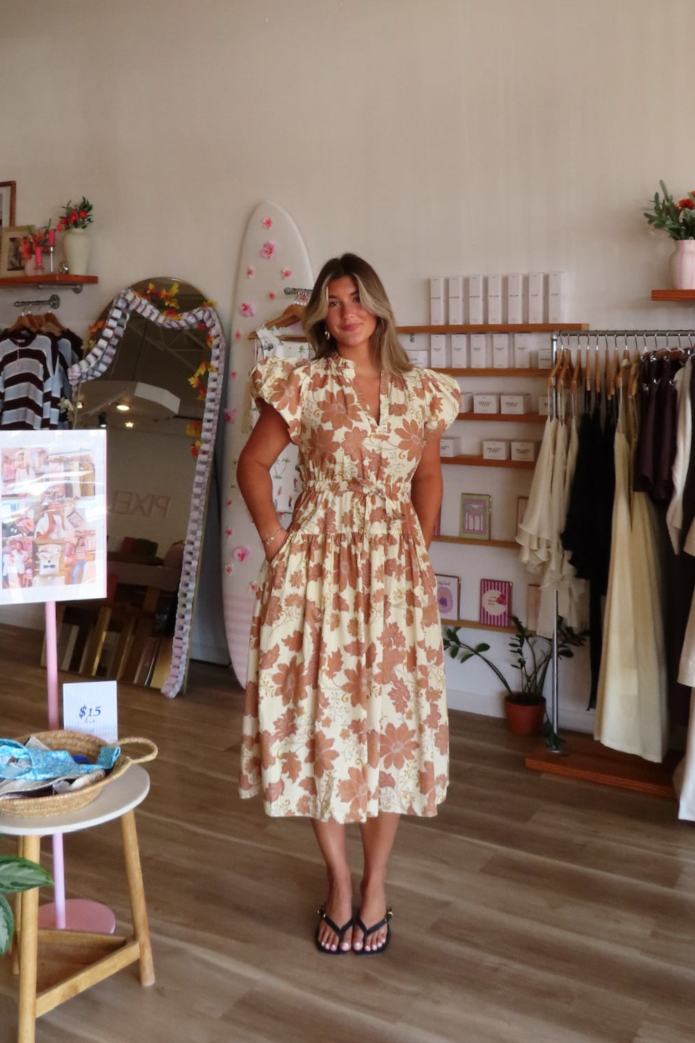 Brown, floral midi dress with V neckline, puff sleeves, waist tie, and side pockets | Pixelated Boutique, Boutique Shopping in Virginia Beach, Women’s Boutique, Fall Fashion, Fall Dresses, Fall Shopping, Trendy Fall Outfits, Women’s Fall Clothing, Casual Fall Outfits

