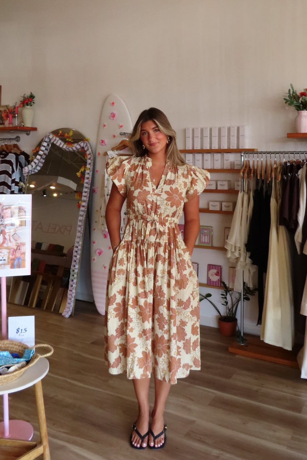 Brown, floral midi dress with V neckline, puff sleeves, waist tie, and side pockets | Pixelated Boutique, Boutique Shopping in Virginia Beach, Women’s Boutique, Fall Fashion, Fall Dresses, Fall Shopping, Trendy Fall Outfits, Women’s Fall Clothing, Casual Fall Outfits
