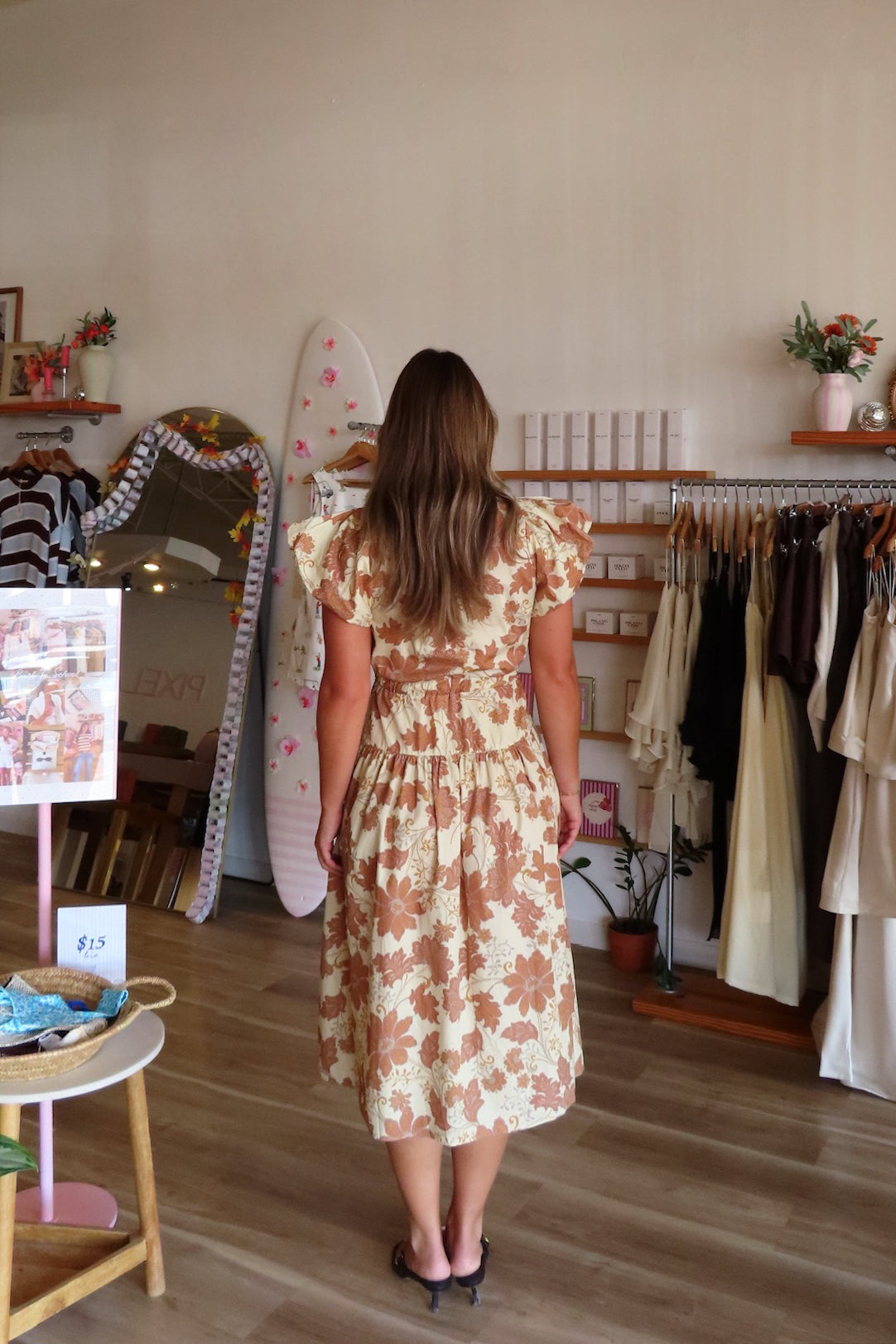 Brown, floral midi dress with V neckline, puff sleeves, waist tie, and side pockets | Pixelated Boutique, Boutique Shopping in Virginia Beach, Women’s Boutique, Fall Fashion, Fall Dresses, Fall Shopping, Trendy Fall Outfits, Women’s Fall Clothing, Casual Fall Outfits
