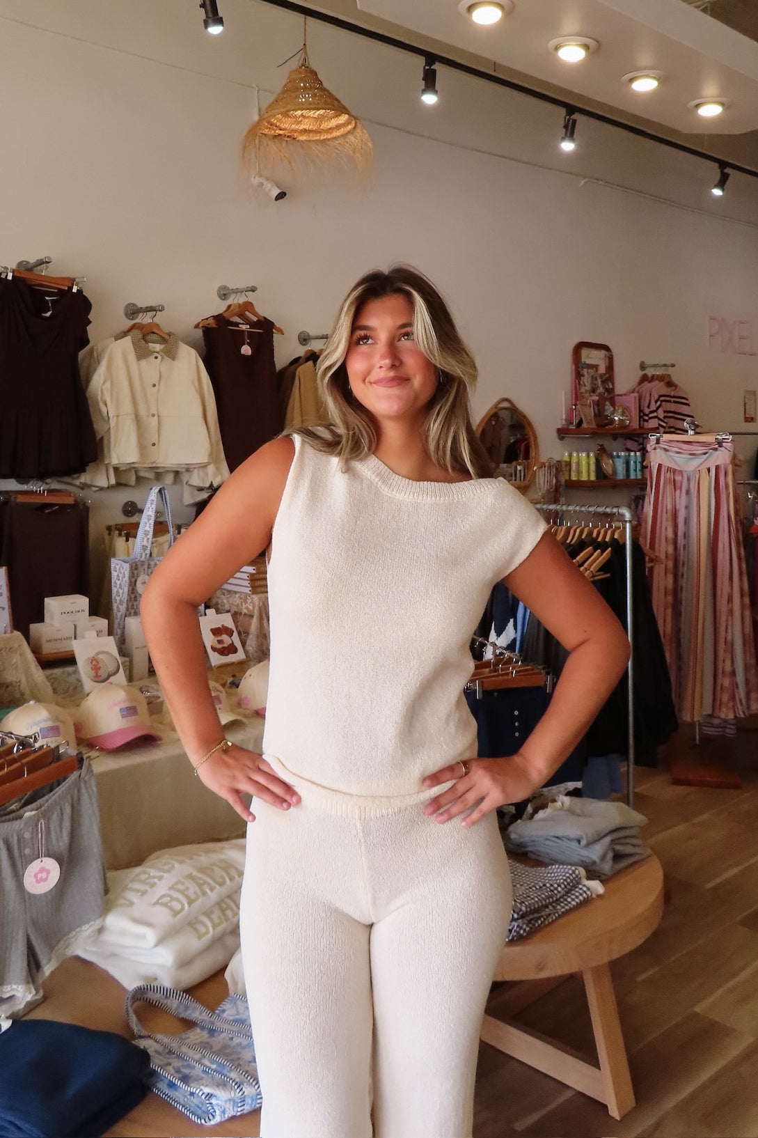 Cream, knit one shoulder top with rolled hem and wide leg pants with elastic waistband | Pixelated Boutique, Boutique Clothing in Virginia Beach, Statement Sweaters, Chunky Sweaters, Trendy Sweaters, Cozy Knit Sweaters for Women, Oversized Sweaters, Cute Fall Sweaters, Fall Fashion Inspiration  
