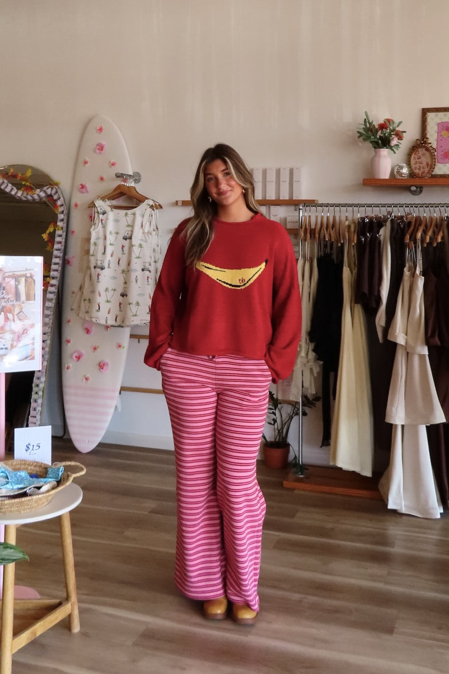 Pink and red, striped lounge pants with wide leg, drawstring waist, and side pockets | Pixelated Boutique, Boutique Shopping in Virginia Beach, Loungewear Set, Chic Lounge Set, Matching Lounge Set, Women’s Loungewear, Lounge Set for Winter, Cozy Fall Outfit, Fall Fashion, Winter Layering, Winter Lounge Pants for Women