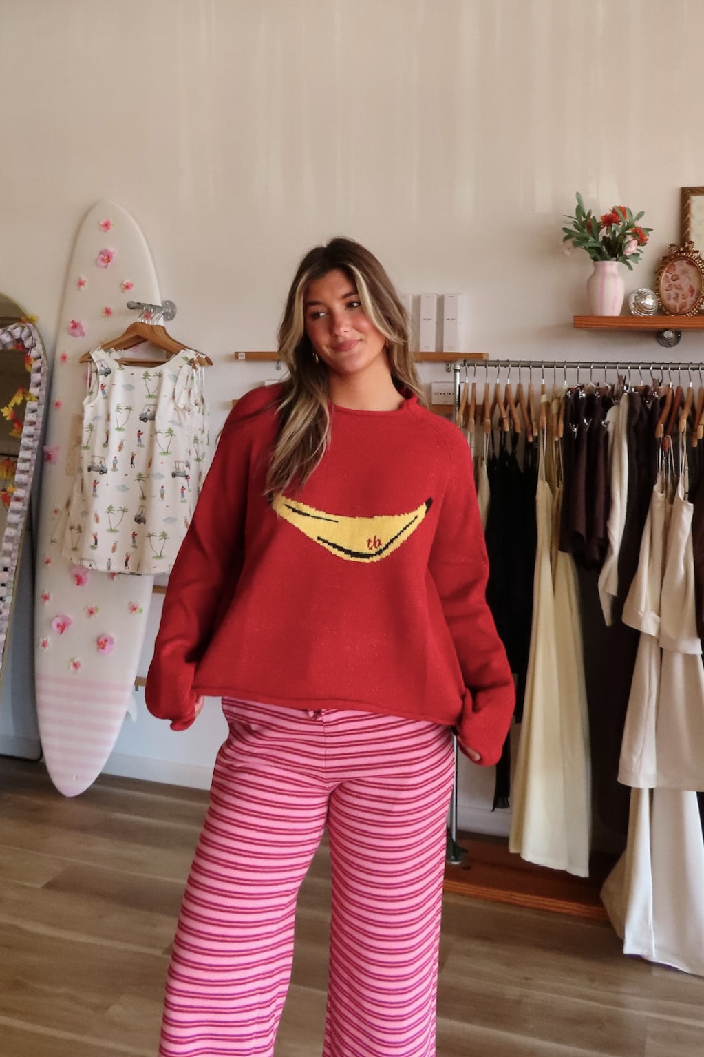 Red, banana graphic sweater with rolled edges and balloon sleeves | Pixelated Boutique, Boutique Clothing in Virginia Beach, Statement Sweaters, Chunky Sweaters, Trendy Sweaters, Cozy Knit Sweaters for Women, Oversized Sweaters, Cute Fall Sweaters, Fall Fashion Inspiration  
